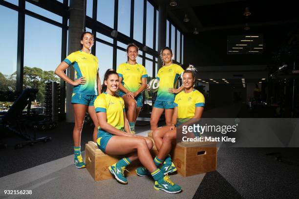 Alicia Quirk, Charlotte Caslick, Evania Pelite, Dominique Du Toit and Emma Tonegato of the Australian Women's Sevens team pose during the Australian...