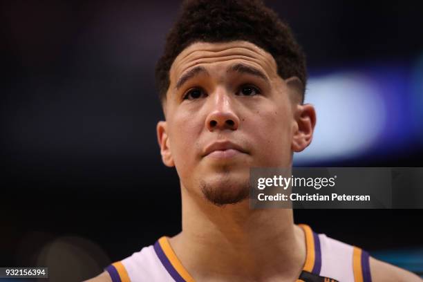 Devin Booker of the Phoenix Suns during the second half of the NBA game against the Cleveland Cavaliers at Talking Stick Resort Arena on March 13,...