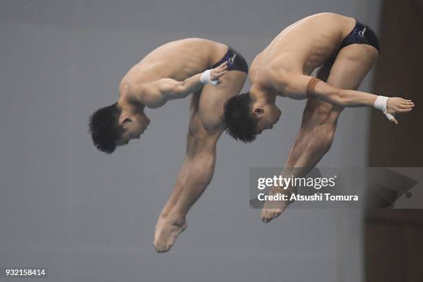 Aisen Chen and Hao Yang of China compete in the Men's 10m Synchro Platform final during day one of the FINA Diving World Series Fuji at Shizuoka...