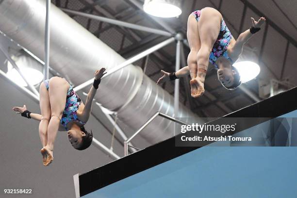 Matsuri Arai and Minamai Itahashi of Japan compete in the Women's 10m Synchro Platform final during day one of the FINA Diving World Series Fuji at...