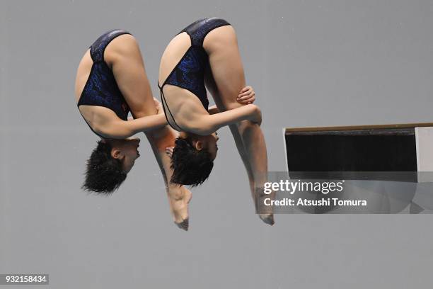 Jiaqi Zhang and Minjie Zhang of China compete in the Women's 10m Synchro Platform final during day one of the FINA Diving World Series Fuji at...