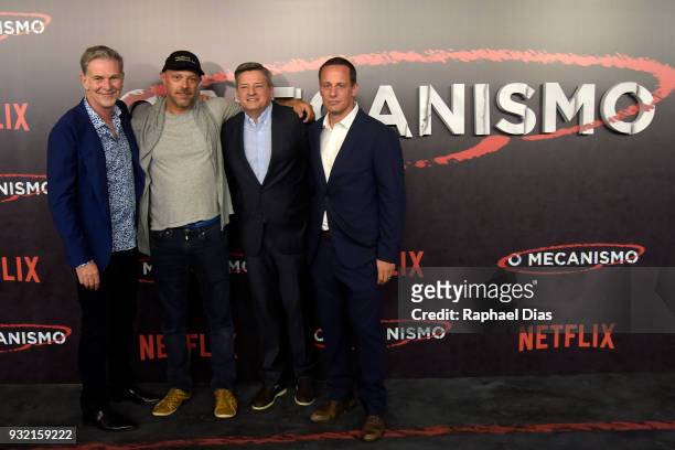 Netflix's CEO Reed Hastings, director Jose Padilha, Netflix's executives Ted Sarandos and Erick Barmak pose during the red carpet for the new Netflix...