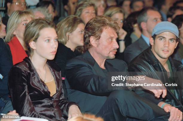 Johnny Hallyday, his daughter Laura Smet and Filip Nikolic attend Leonard's fashion show, where Laeticia Hallyday is parading, Paris, 19th October...