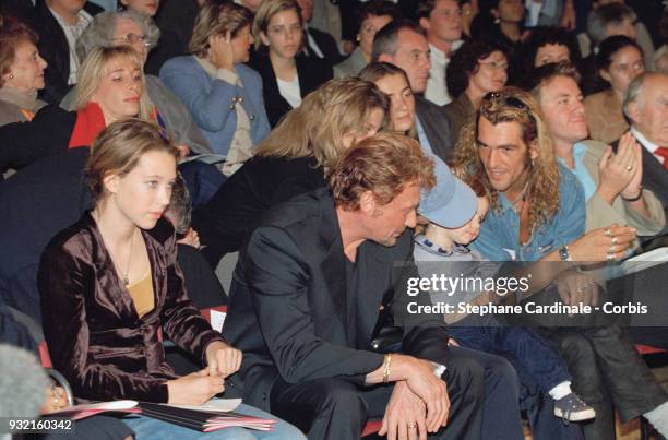 Johnny Hallyday, his daughter Laura Smet and Filip Nikolic attend Leonard's fashion show, where Laeticia Hallyday is parading, Paris, 19th October...