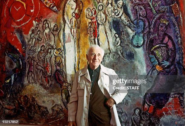 Famous painter Marc Chagall, born in Vitebsk, Belarus, poses 02 July 1977 in front of one of his works, inspired with 25 others by Old and New...