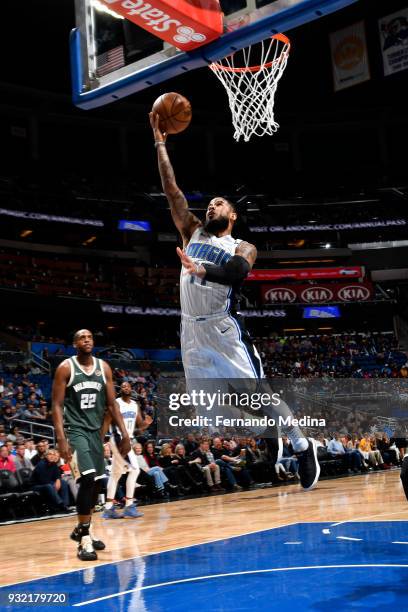 Augustin of the Orlando Magic shoots the ball against the Milwaukee Bucks on March 14, 2018 at Amway Center in Orlando, Florida. NOTE TO USER: User...