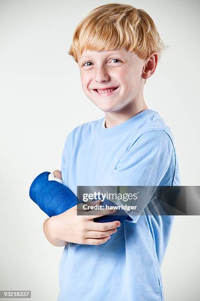it doesn't hurt so bad - boy broken arm stock pictures, royalty-free photos & images