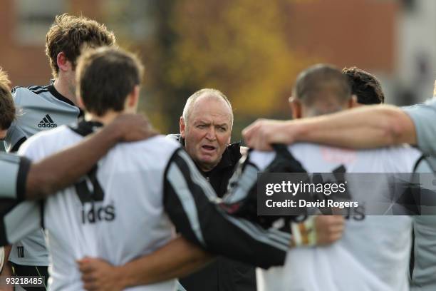 Graham Henry, the New Zealand head coach talks to his team during the All Blacks training session held at Latymers School on November 19, 2009 in...