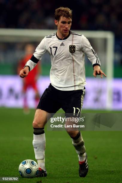 Per Mertesacker of Germany runs with the ball during the International Friendly match between Germany and Ivory Coast at the Schalke Arena on...