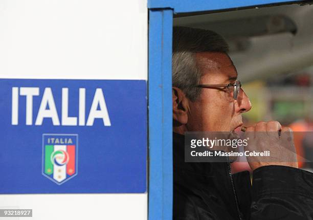 Marcello Lippi head coach of Italy smokes a cigar before the International Friendly Match between Italy and Sweden at Dino Manuzzi Stadium on...