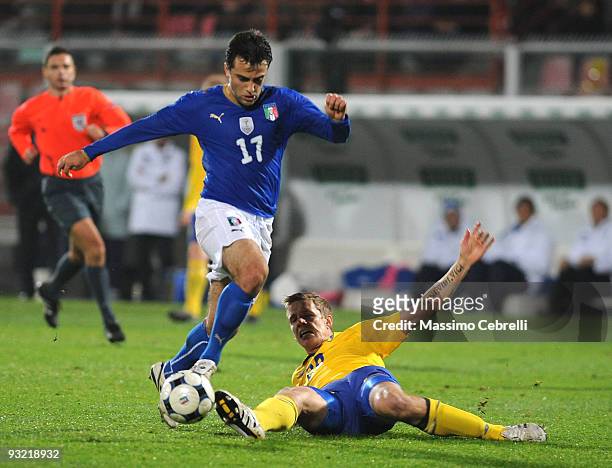 Giuseppe Rossi of Italy battles for the ball against Pontus Wernbloom of Sweden during the International Friendly Match between Italy and Sweden at...