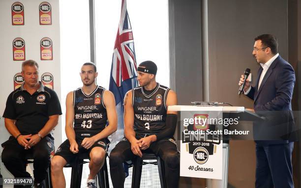 Jeremy Loeliger speaks as coach Dean Vickerman, Josh Boone and Chris Goulding of Melbourne United look on during the NBL Grand Final media...