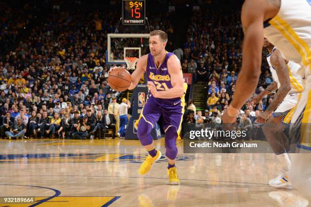 Travis Wear of the Los Angeles Lakers handles the ball against the Golden State Warriors n March 14, 2018 at ORACLE Arena in Oakland, California....