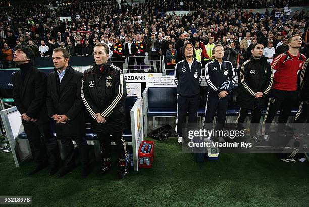 Head coach Joachim Loew, assistant coach Hansi Flick and goalies coach Andreas Koepke of Germany are pictured ahead the International friendly match...