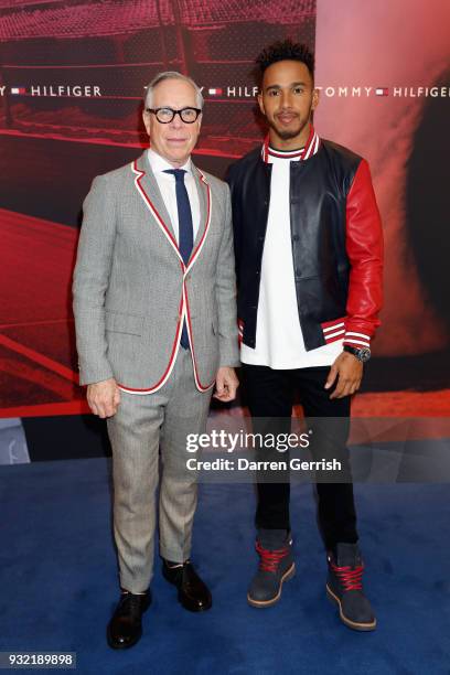 Designer Tommy Hilfiger and Formula One driver Leiws Hamilton pose together at the Tommy Hilfiger announcement Formula One World Champion Lewis...