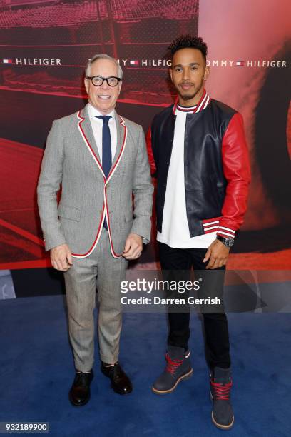 Designer Tommy Hilfiger and Formula One driver Leiws Hamilton pose together at the Tommy Hilfiger announcement Formula One World Champion Lewis...