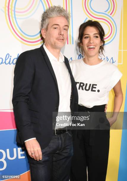 Presenters Pierre Zeni and Laurie Cholewa attend "La Ligue Contre Le Cancer" Celebrates Its 100th Anniversary at Cite des Sciences on March 14, 2018...