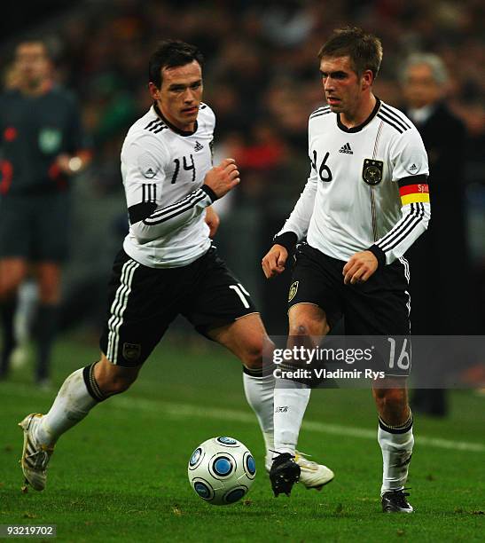 Philipp Lahm and Piotr Trochowski of Germany in action during the International friendly match between Germany and the Ivory Coast at the Schalke...