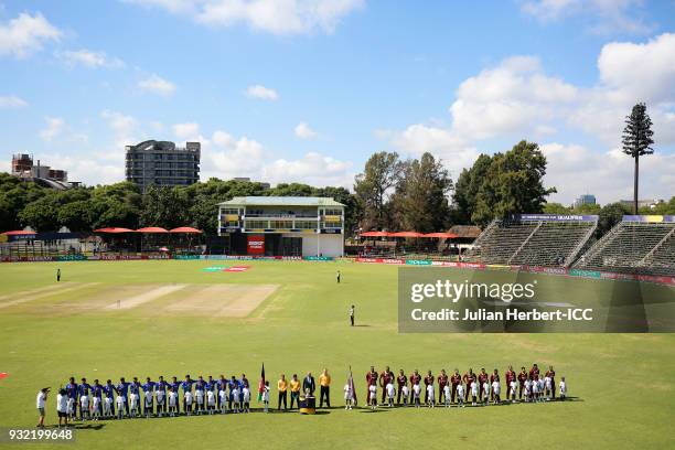 The teams line up for the national anthems before The ICC Cricket World Cup Qualifier between The West Indies and Afghanistan at The Harare Sports...