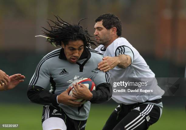 Ma'a Nonu charges Steve Donald during the All Blacks training session held at Latymers School on November 19, 2009 in London, England.