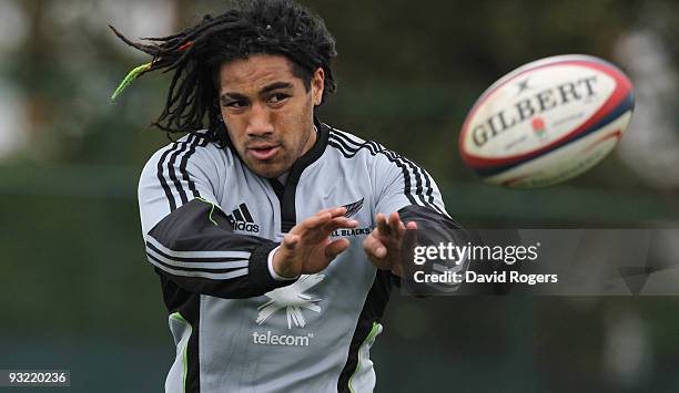 Ma'a Nonu passes the ball during the All Blacks training session held at Latymers School on November 19, 2009 in London, England.