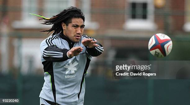 Ma'a Nonu passes the ball during the All Blacks training session held at Latymers School on November 19, 2009 in London, England.