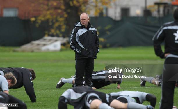 Graham Henry, the New Zealand head coach looks on during the All Blacks training session held at Latymers School on November 19, 2009 in London,...