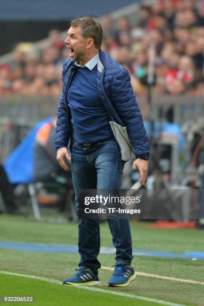 Head coach Bernd Hollerbach of Hamburg gestures during the Bundesliga match between FC Bayern Muenchen and Hamburger SV at Allianz Arena on March 10,...