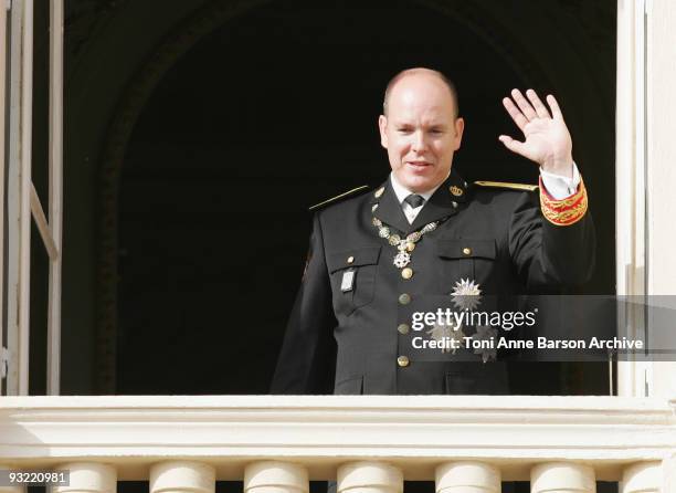 Prince Albert II of Monaco waves from the Palace after the Mass on November 19, 2009 in Monaco.