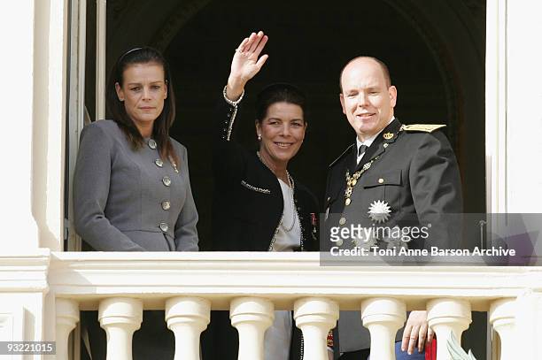 Princess Stephanie of Monaco, Princess Caroline of Hanover and HSH Prince Albert II of Monaco wave from the balcony at the Palace after the Mass on...