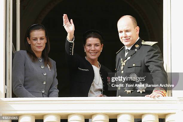 Princess Stephanie of Monaco, Princess Caroline of Hanover and HSH Prince Albert II of Monaco wave from the balcony at the Palace after the Mass on...