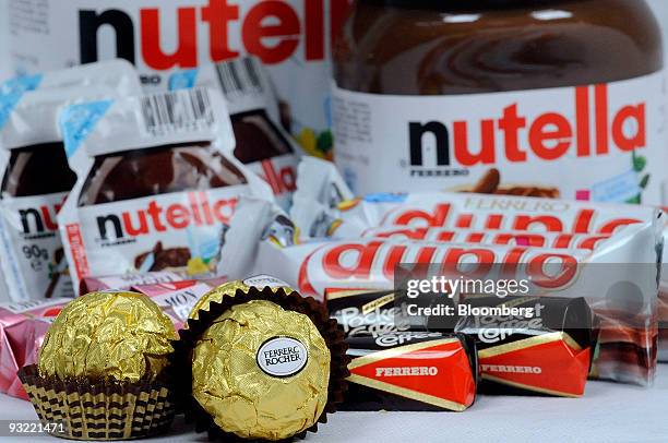 Ferrero SpA's Duplo, Fererro Rocher, Nutella, Mon Cheri and Pocket Coffee chocolate products are arranged for a photograph in Milan, Italy, on...
