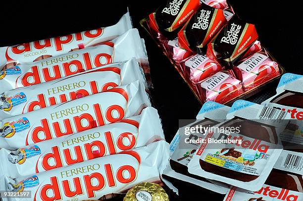 Ferrero SpA's Duplo, Fererro Rocher, Nutella and Pocket Coffee chocolate products are arranged for a photograph in Milan, Italy, on Thursday, Nov....