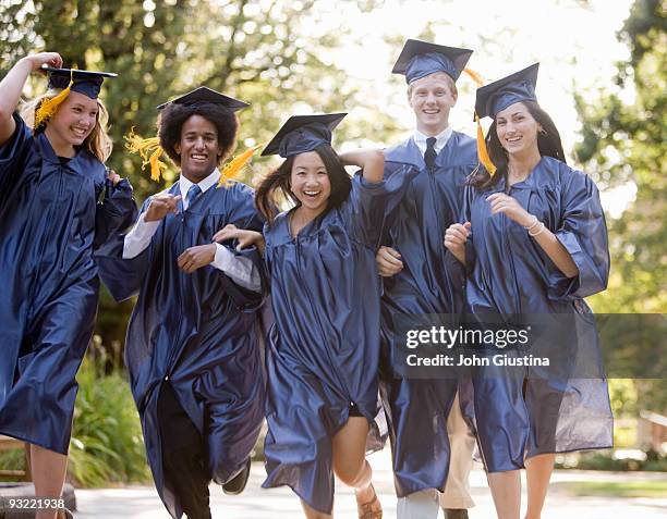 Teens Celebrate Graduation From High School, Foto de stock