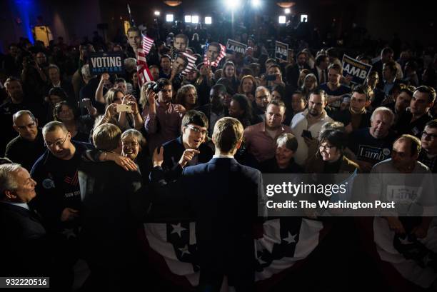 Democrat candidate Conor Lamb greets his supporters after giving his victory speech at the Hilton Garden Inn Pittsburgh-Southpointe after winning the...