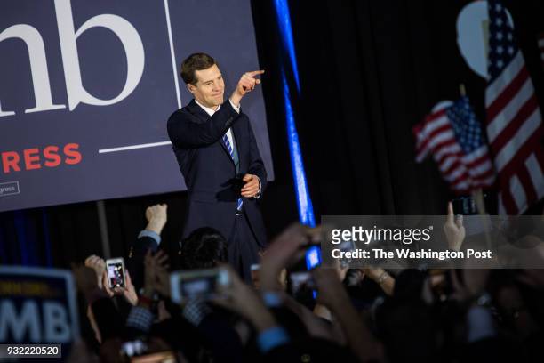 Democrat candidate Conor Lamb enters the stage and greet supporters before giving his victory speech at the Hilton Garden Inn Pittsburgh-Southpointe...