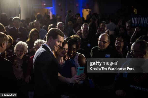 Democrat candidate Conor Lamb greets his supporters after giving his victory speech at the Hilton Garden Inn Pittsburgh-Southpointe after winning the...