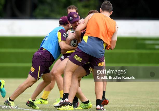 Matt Lodge takes on the defence during the Brisbane Broncos NRL training session on March 15, 2018 in Brisbane, Australia.