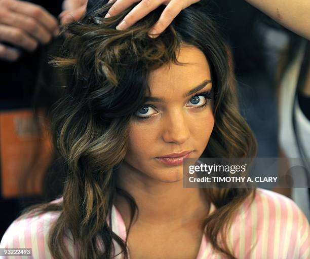 Victoria's Secret model Miranda Kerr backstage in hair and make-up November 19, 2009 before the start of the Victoria's Secret Fashion Show in New...
