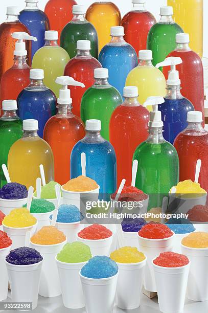 snow cone flavor syrups - snow cones shaved ice stock pictures, royalty-free photos & images