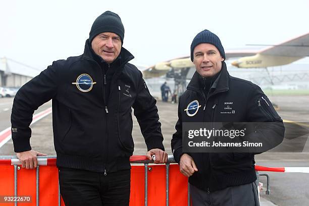 André Borschberg , CEO of Solar Impulse and chairman Bertrand Piccard pose during the preparation of the Solar Impulse airplane HB-SIA for a first...