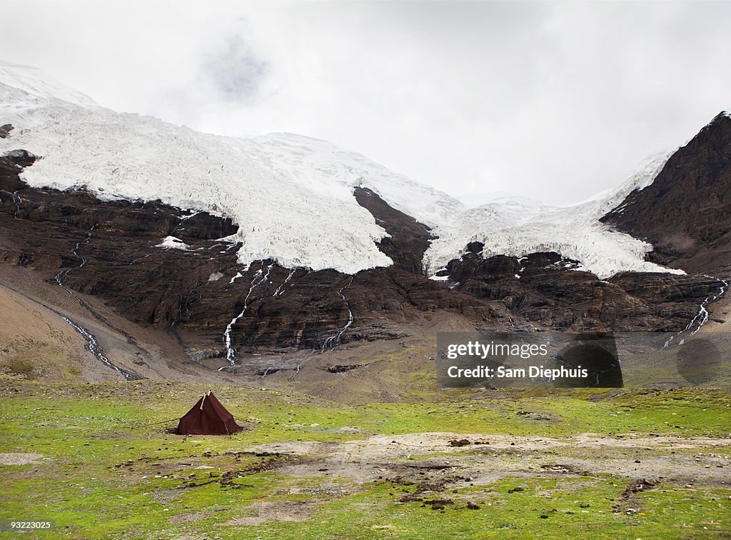 Tent at the Base of a Glacier