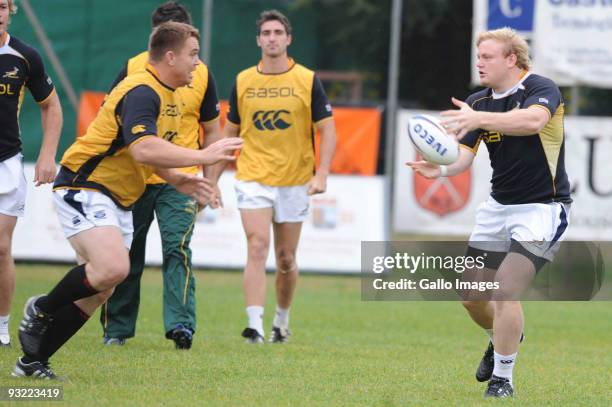 John Smit and Adriaan Strauss of South Africa in action during the Springboks training session at Udine rugby club on November 19, 2009 in Udine,...