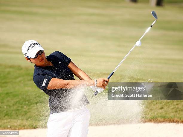 Yani Tseng of Taiwan plays a bunker shot on the 16th hole during the first round of the LPGA Tour Championship presented by Rolex at the Houstonian...