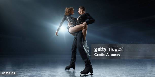 figure skating. ice skaters couple - figure skating couple stock pictures, royalty-free photos & images