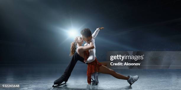 figure skating. ice skaters couple - figure skating couple stock pictures, royalty-free photos & images