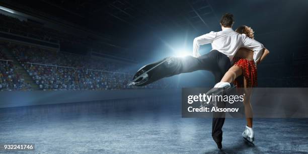 figure skating. ice skaters couple - figure skating fall stock pictures, royalty-free photos & images