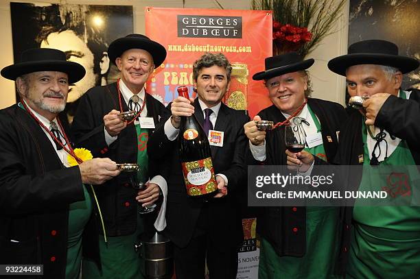 French wine manufacturer Frank Duboeuf officially opens a jeroboam of Beaujolais Nouveau during Beaujolais Nouveau celebrations in New York, November...