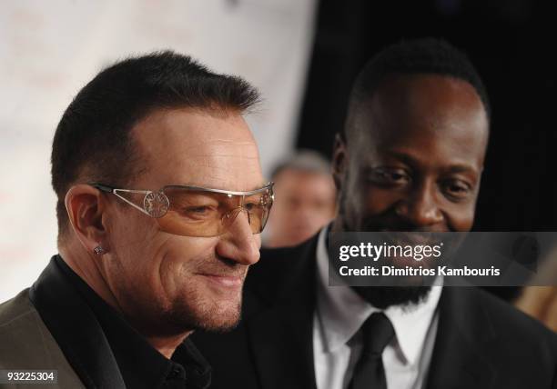 Musicians Bono and Wyclef Jean attend the 2009 Robert F. Kennedy Center Ripple of Hope Awards dinner at Pier Sixty at Chelsea Piers on November 18,...