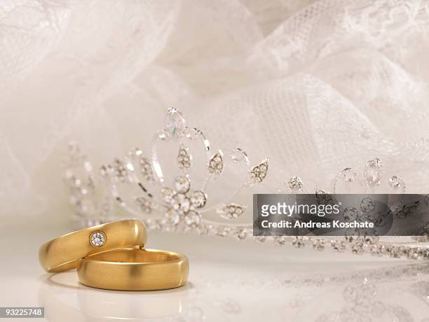 wedding rings, crown and white lace - wedding tiara stock pictures, royalty-free photos & images